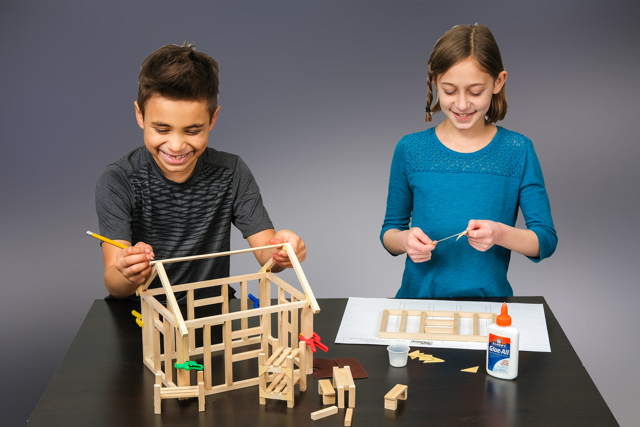 kids convert blueprints into structures